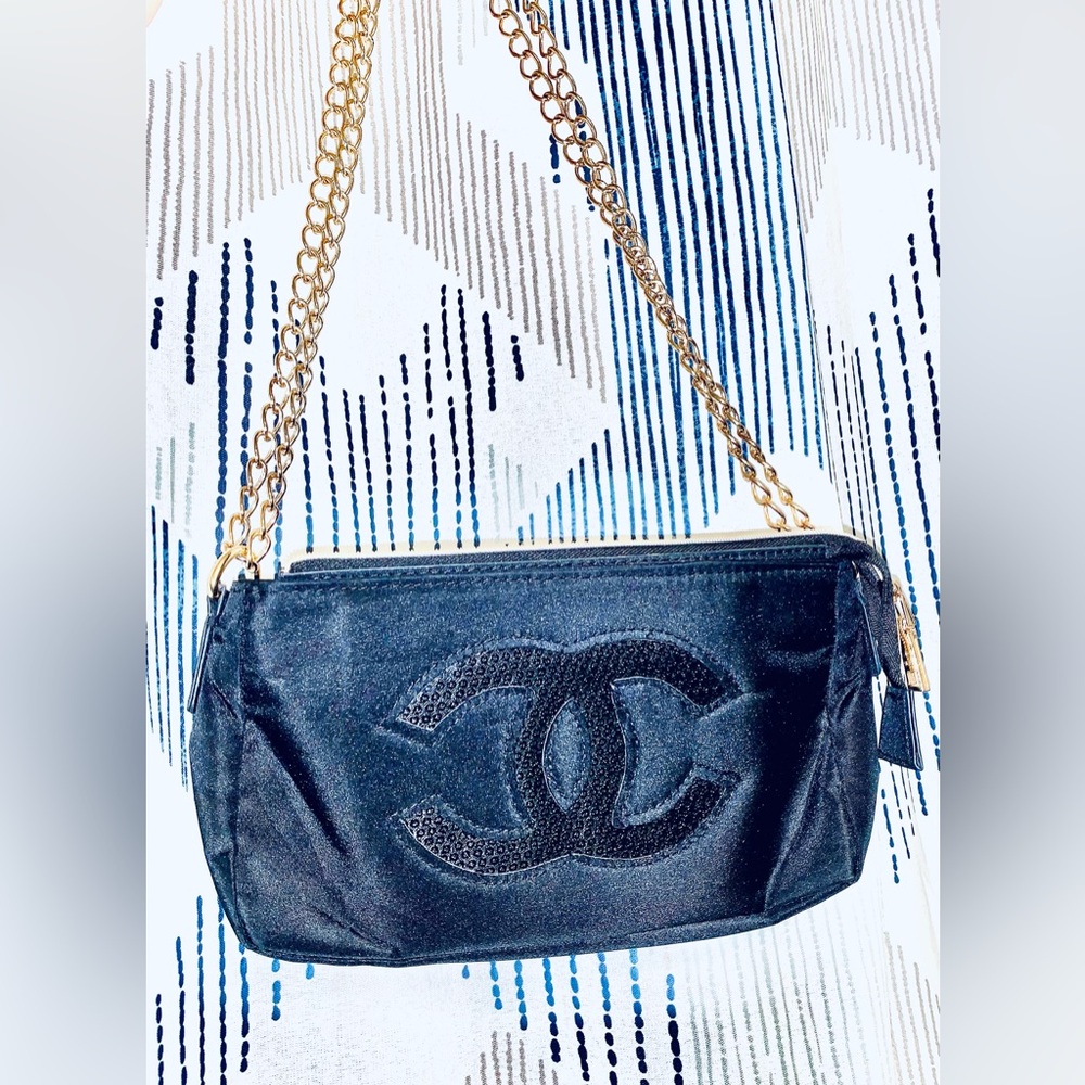 Chanel Black and Gold Shoulder Bag with Luxurious Appeal